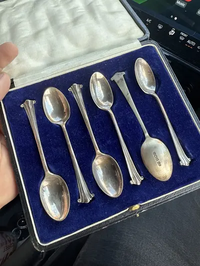 Spoons arranged in a lined presentation box