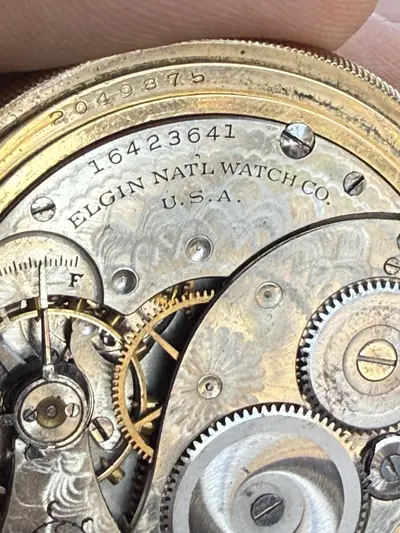 Close-up of the mechanism inside a pocket watch